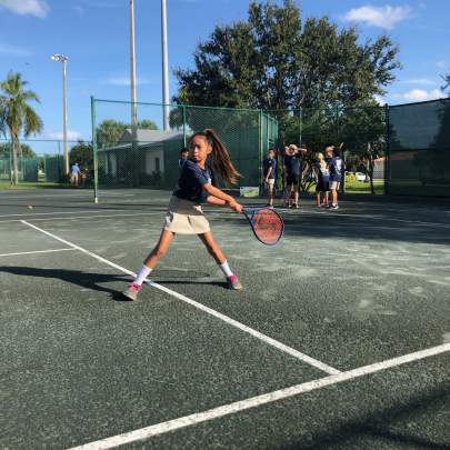 Girl playing tennis 